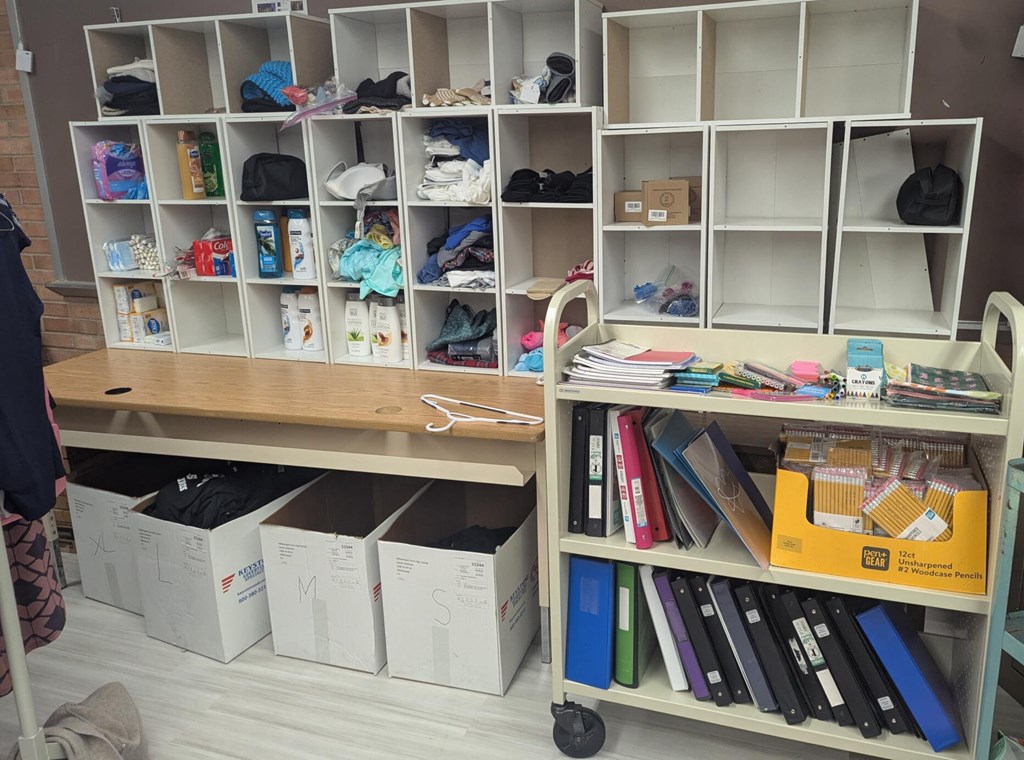 shelves of different clothes and hygiene products 