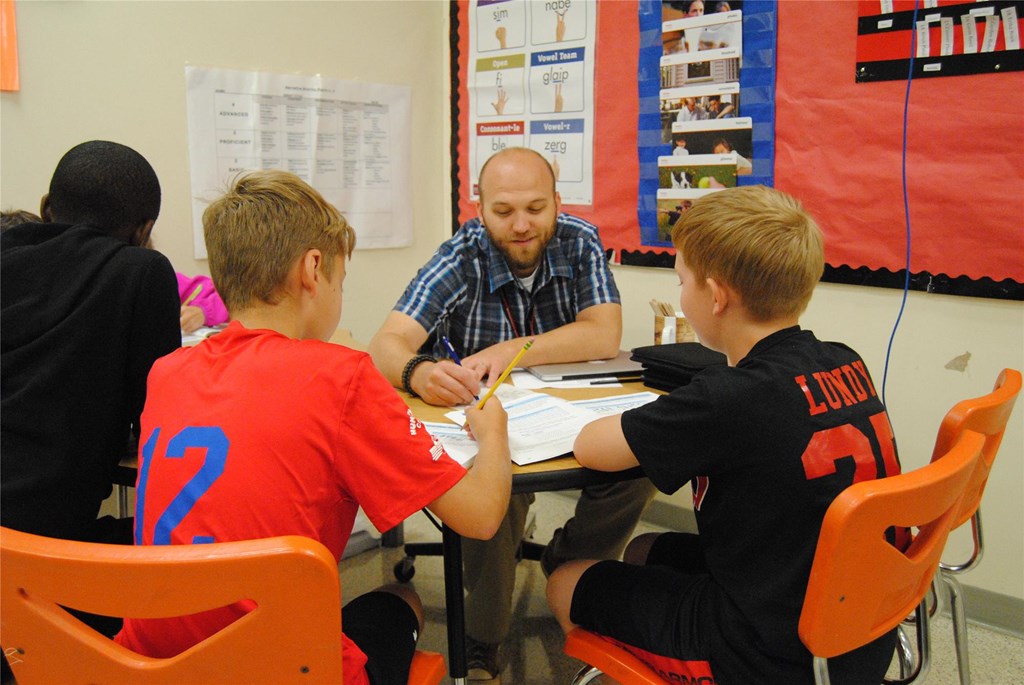 Mr. Woleslagle works with students.