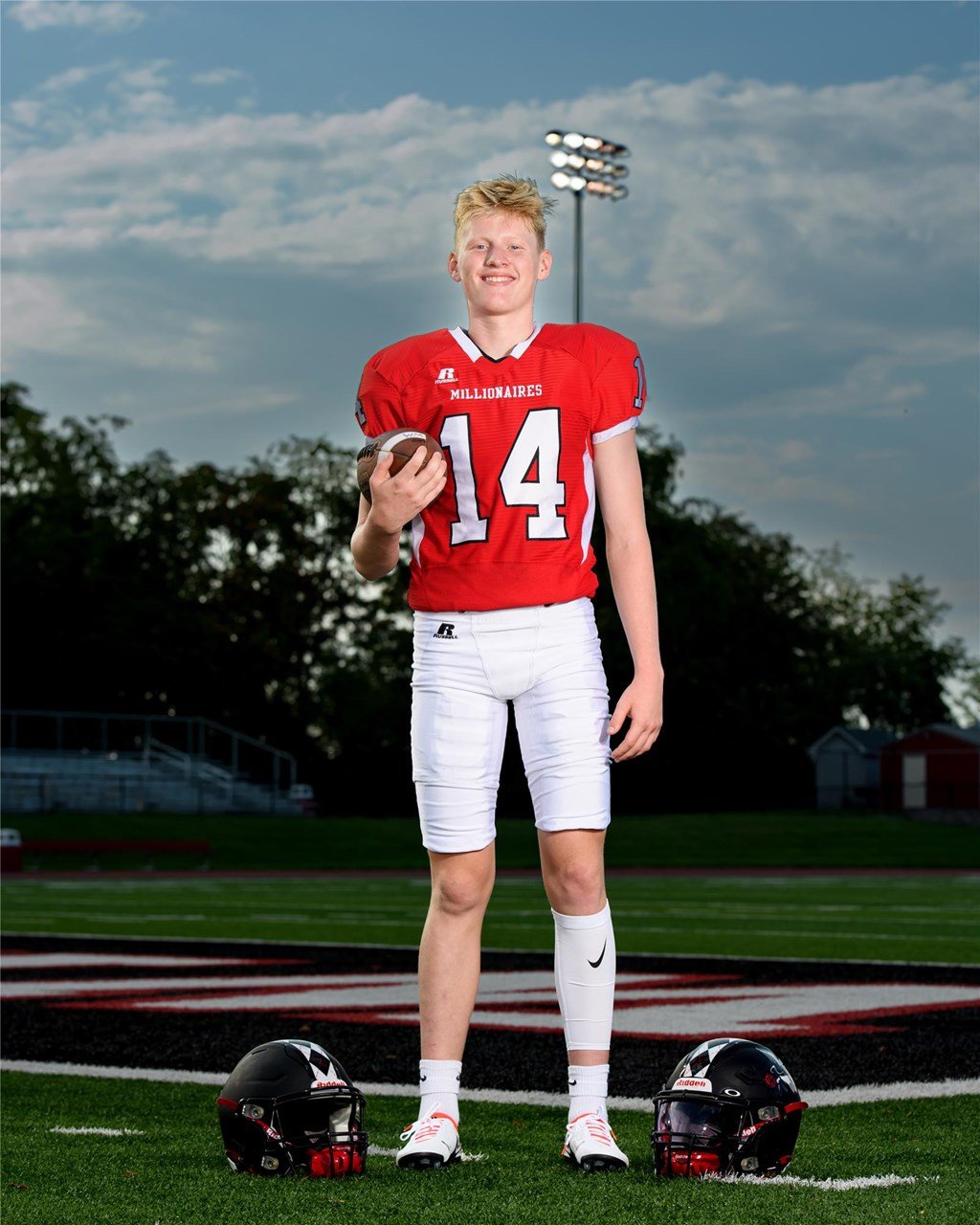 A portrait of Connor Poole in his football uniform.